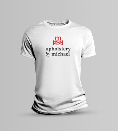 Mockup of white T-shirt with Upholstery By Michael logo printed in red and charcoal